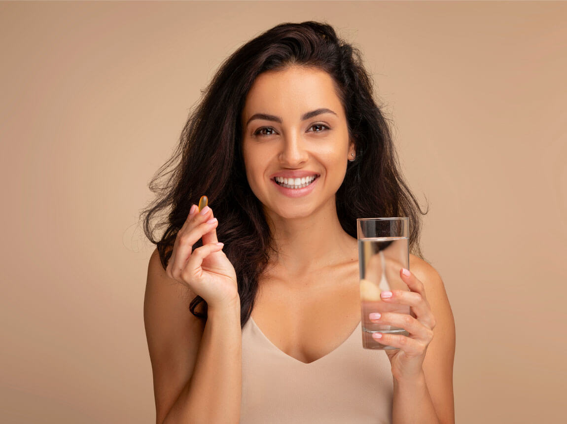 femeie cu capsulă - biotină