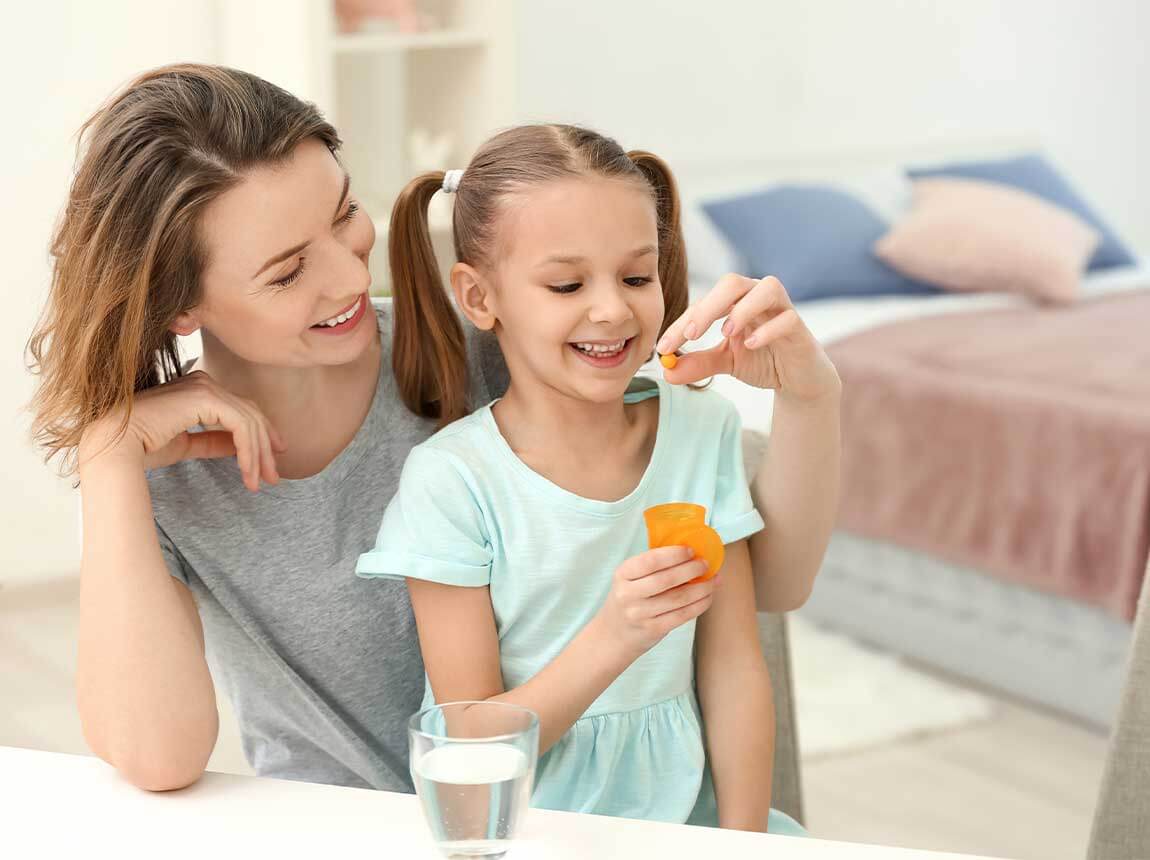 o femeie cu un copil &ndash; tablete cu zinc